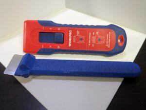 a razor blade scraper and a bambu labs style scraper with a blue handle