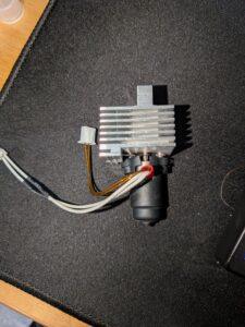 a 3d printer hotend, with thermistor and heater wires.